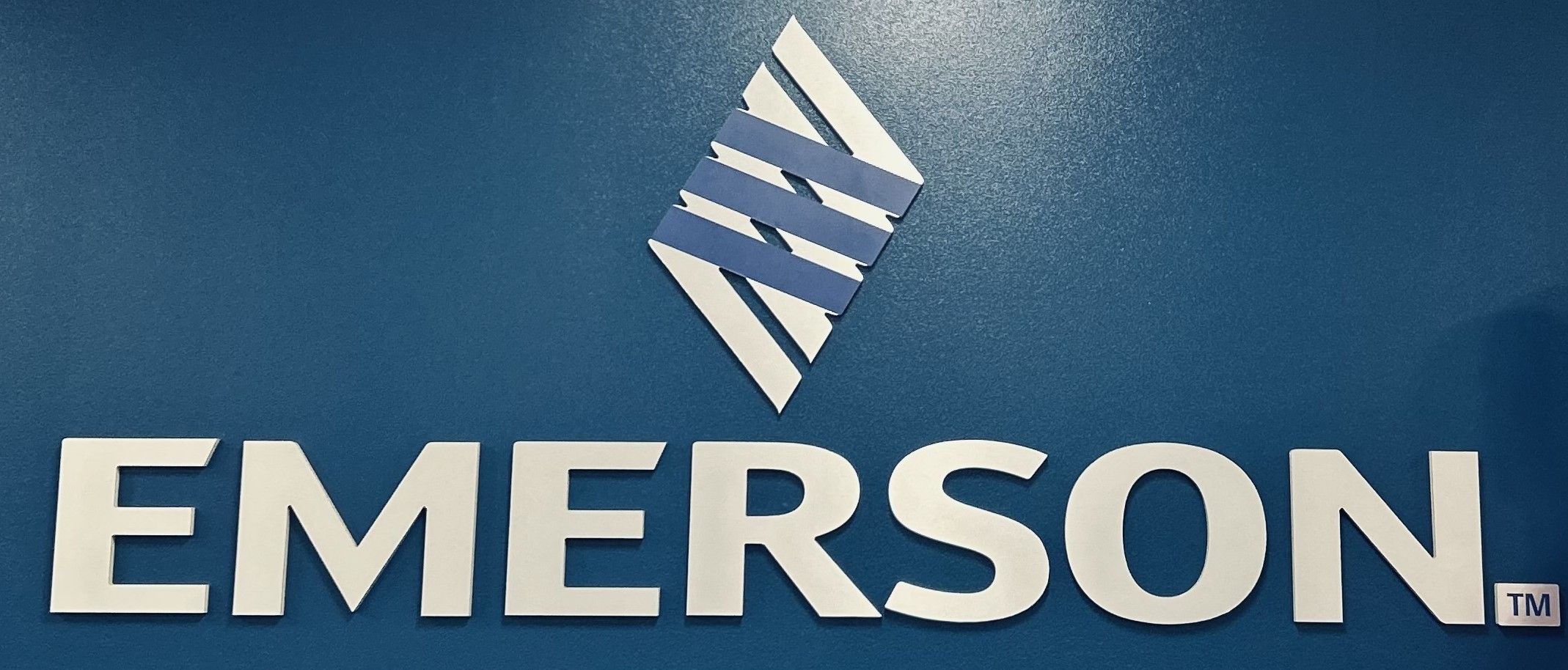 emerson logo Emerson logo with blue background.
