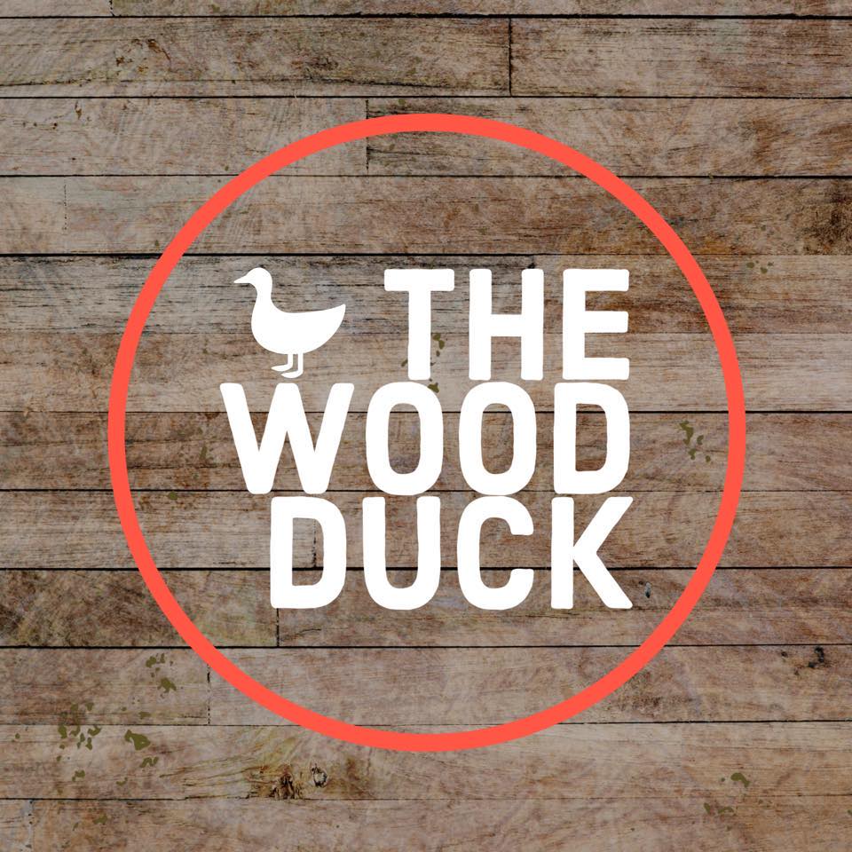 thewoodduck The Wood Duck logo on wooden background.