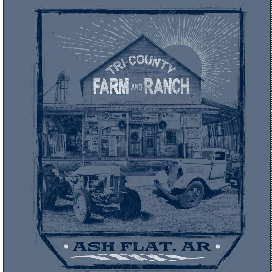 tricountyfarmandhome Vintage farm and ranch store with old vehicles.
